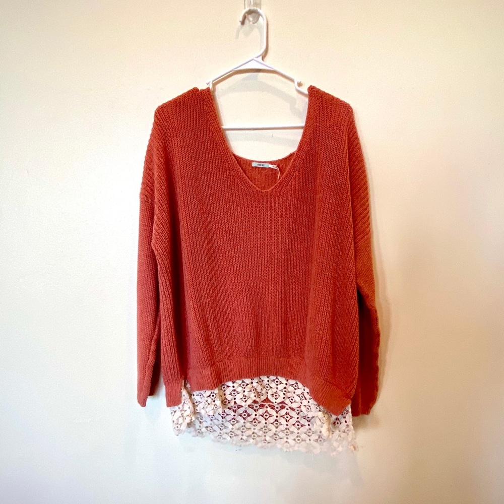 Oversized orange sweater with lace detail